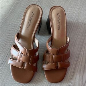 12Thompson tan-colored strappy open-toe design with a block heel sandal